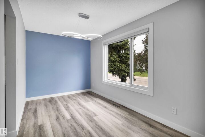 Property Photo: 14208 51 Street NW AB T5A 0A9