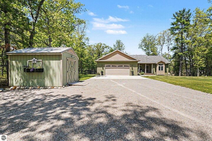 Property Photo:  1735 Iroquois Trail  MI 48748 