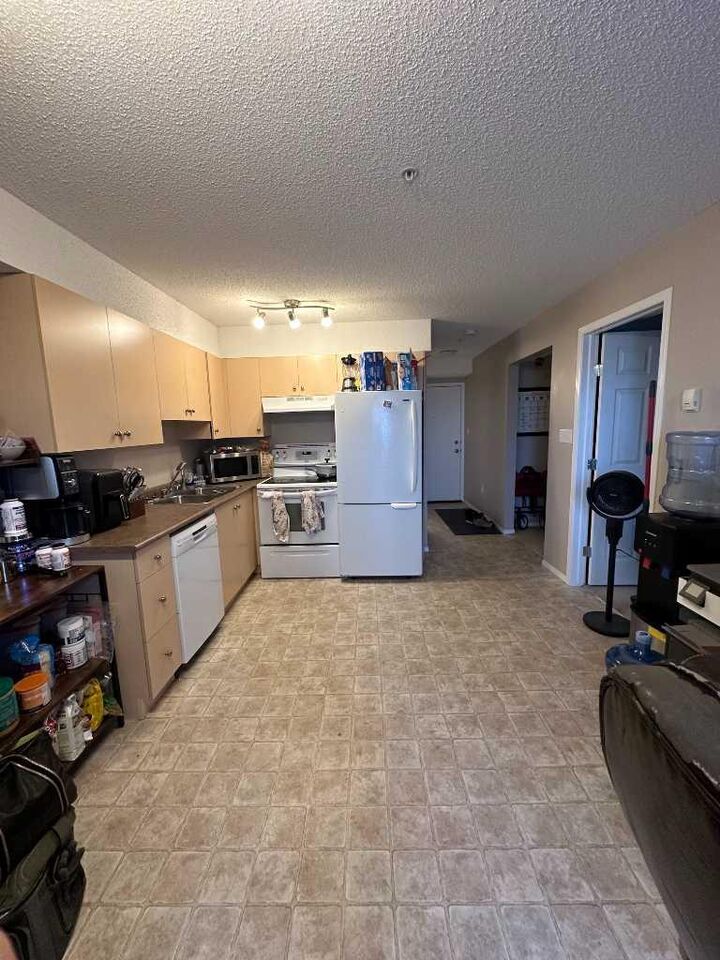 Property Photo: 204 17 Street E 306 AB T1R 1R1
