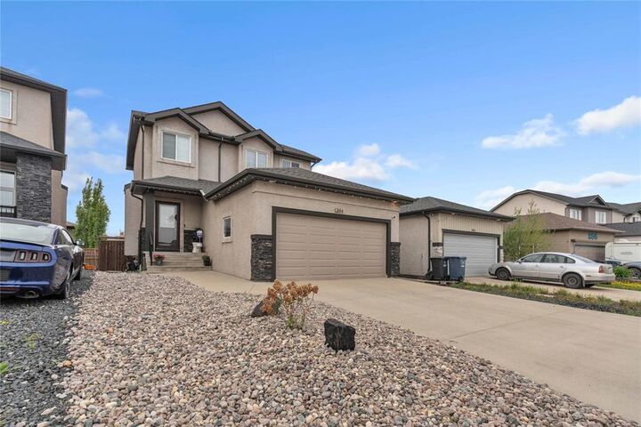 Property Photo: 264 Shady Shores Drive MB R2C 3C2