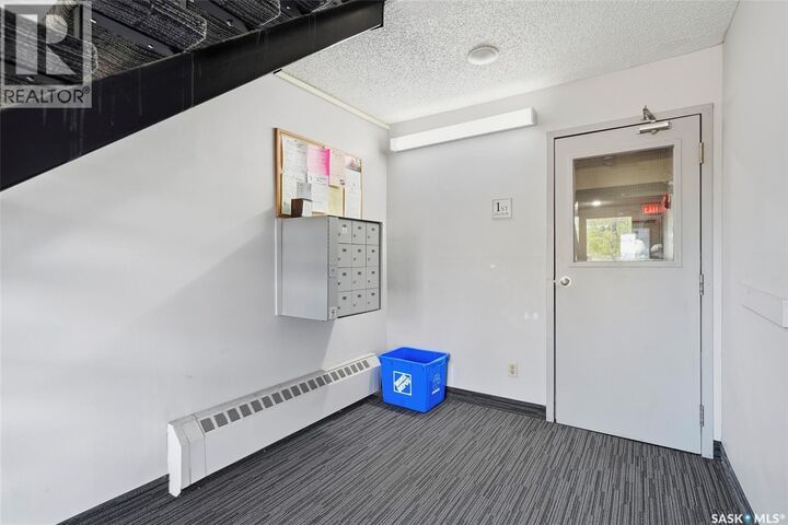 Property Photo:  202 345 Kingsmere Boulevard  SK S7J 4J6 