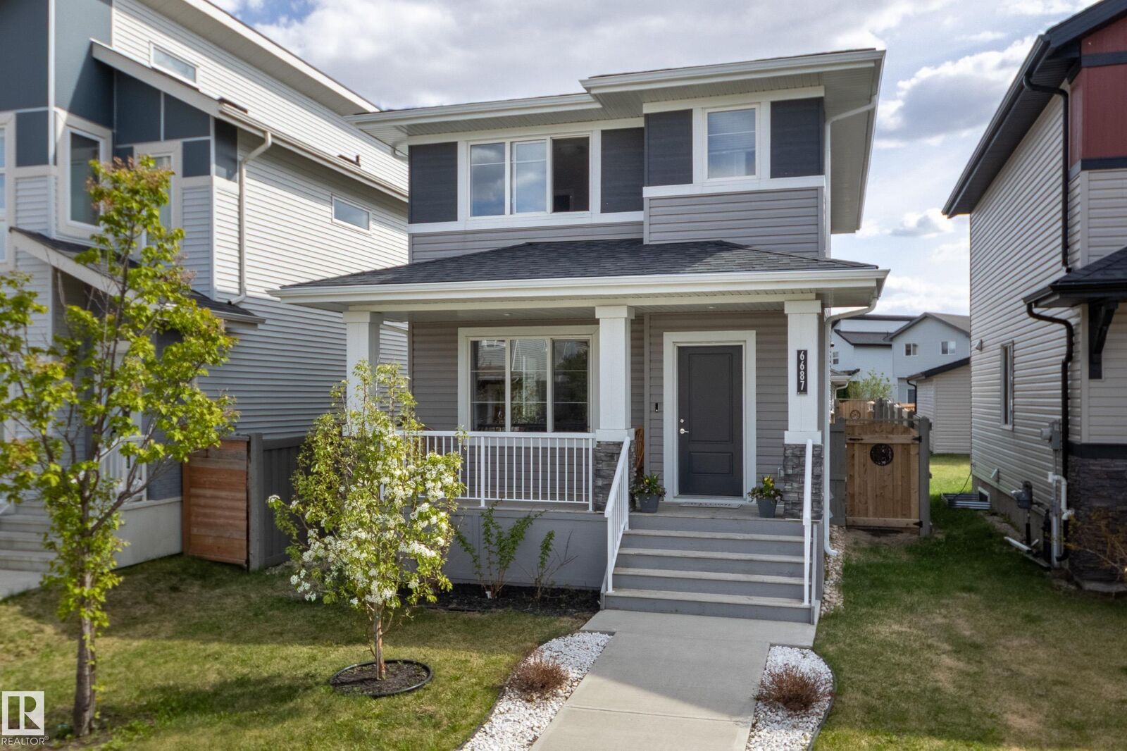Property Photo:  6687 Cardinal Road SW  AB T6W 2Y4 