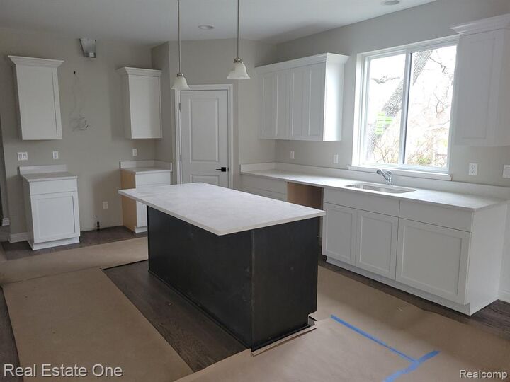 Property Photo:  1983 Chancery Drive  MI 48085 1012 