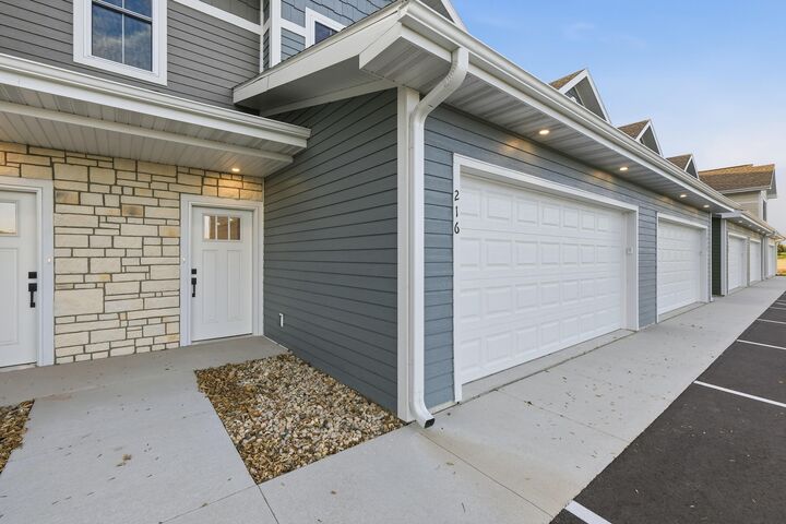 Property Photo:  208 Settlers Dr  WI 53549 