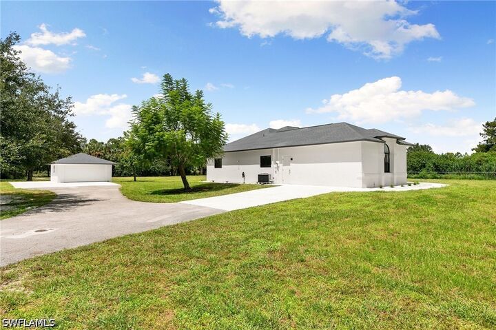 Property Photo: 221 10th Street SE FL 34117
