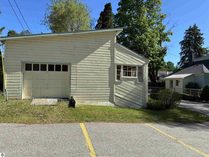 Property Photo:  407 N Bridge  MI 49615 