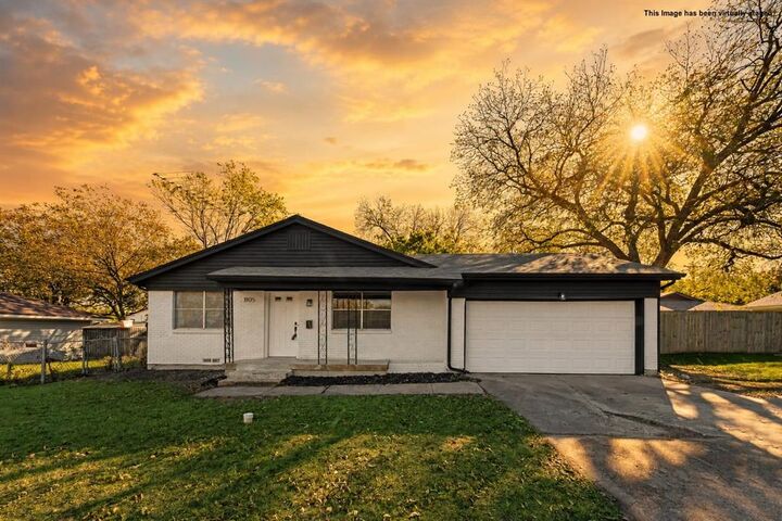 Property Photo: 1105 W White Avenue TX 75069
