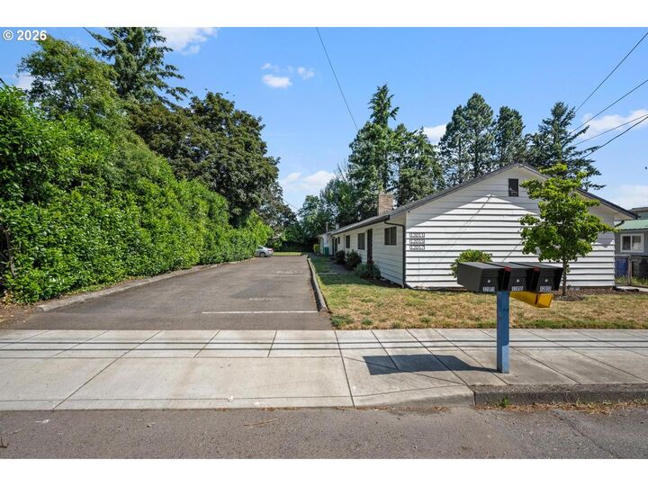 Property Photo:  12011 SE Market St  OR 97216 