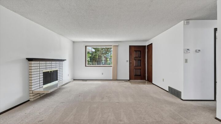 Property Photo:  608 W Regina Ave  WA 99218 