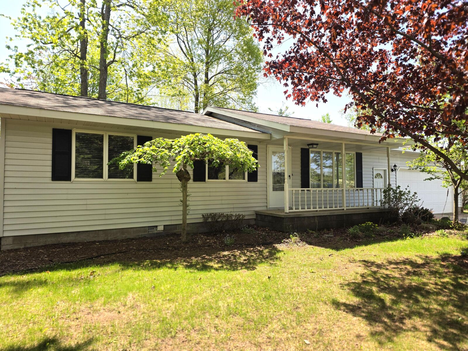 Property Photo:  4995 Long Rapids Road  MI 49707 