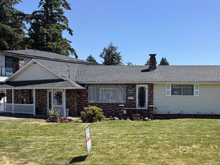 Property Photo:  12204 85A Avenue  BC V3W 3H6 