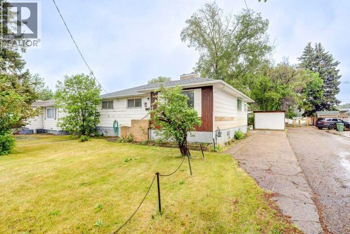 Property Photo:  5104 54 Avenue  AB T1G 1N3 