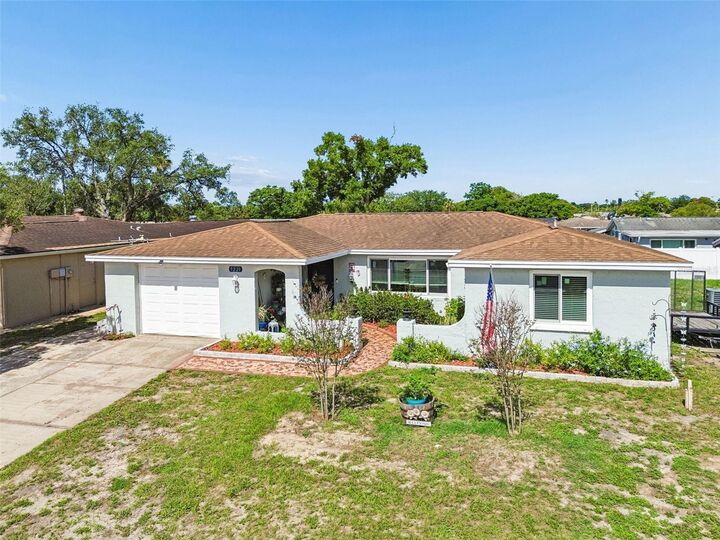 Property Photo:  9221 Rainbow Lane  FL 34668 