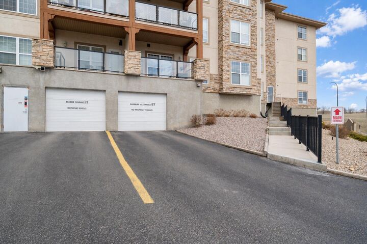 Property Photo:  201 River Ridge Drive NW 327  AB T1A 8V5 