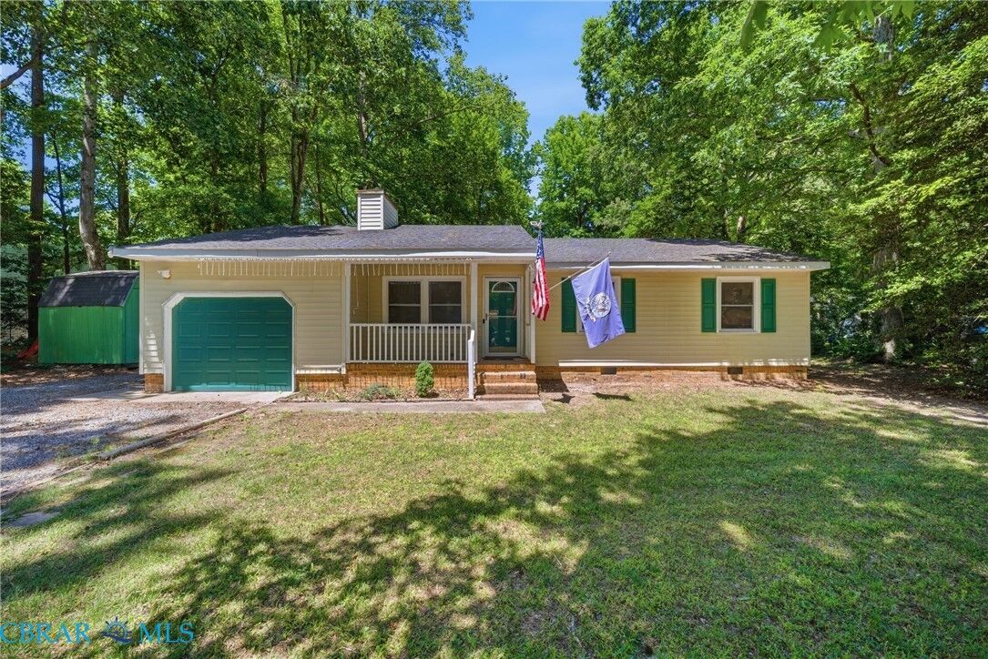 Property Photo:  7133 Lord Carrington Drive  VA 23061 