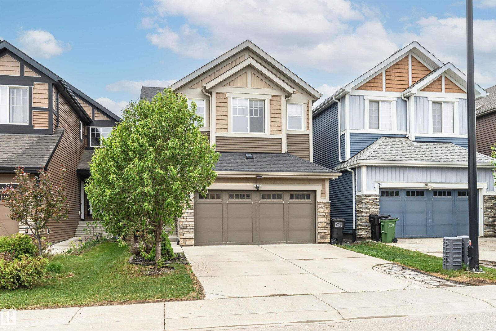 Property Photo:  8744 223 Street NW  AB T5T 7L6 