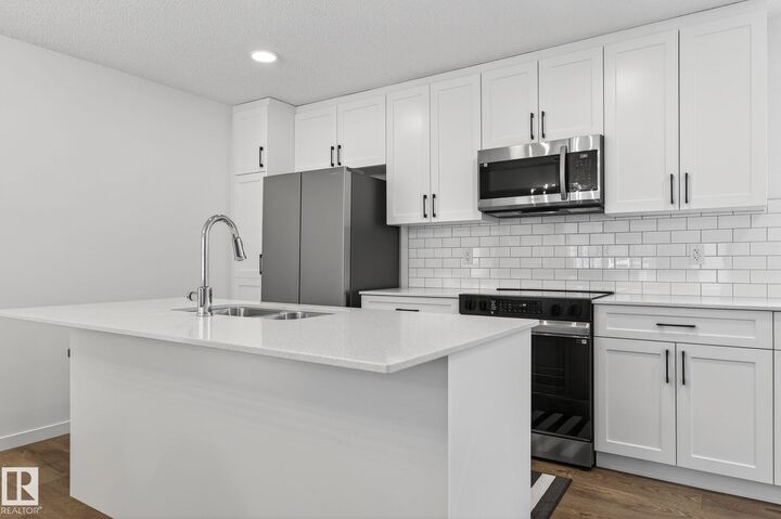 Property Photo:  50 McLaughlin Drive 7  AB T7X 0E1 