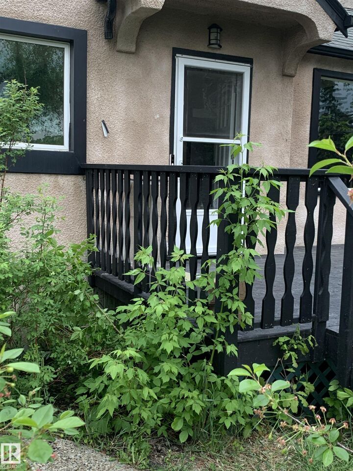 Property Photo: 11842 93 Street NW AB T5G 1E3