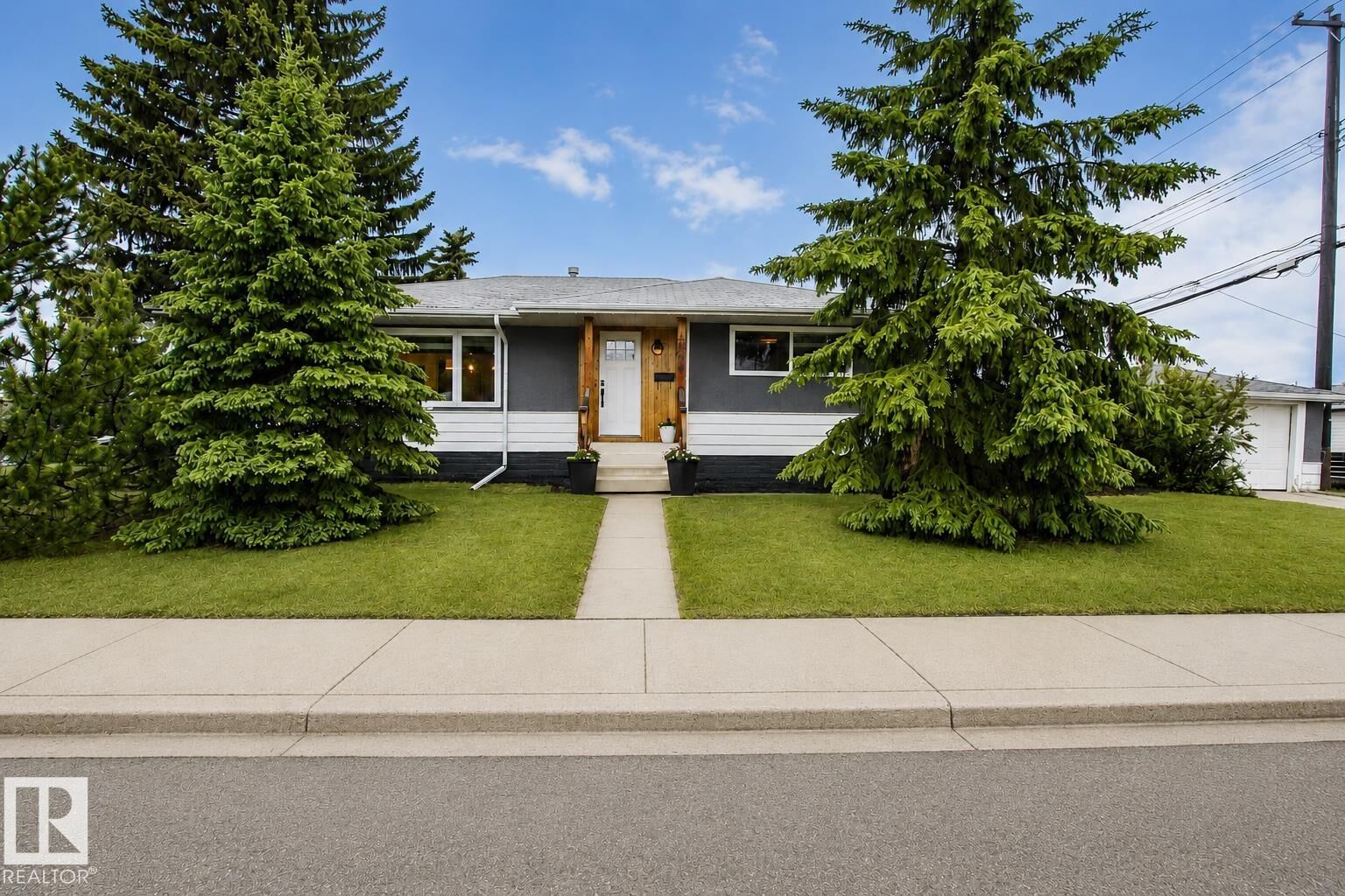 Property Photo:  4904 103 Avenue NW  AB T6A 0S9 