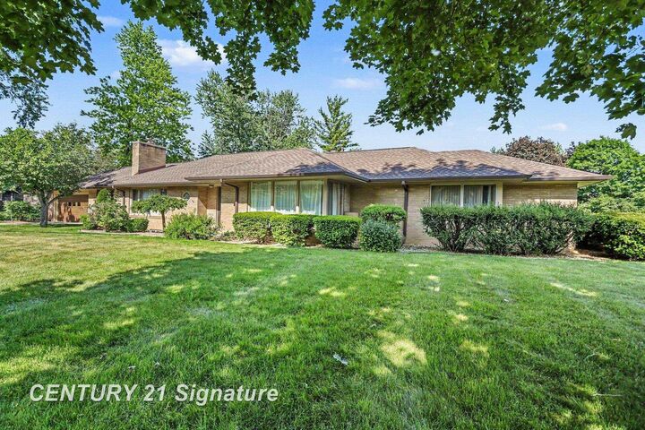 Property Photo:  57 E Hannum Boulevard  MI 48602 