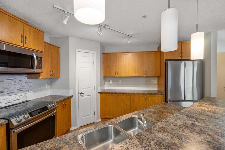 Property Photo:  700 Willowbrook Road NW 2327  AB T4B 0L5 