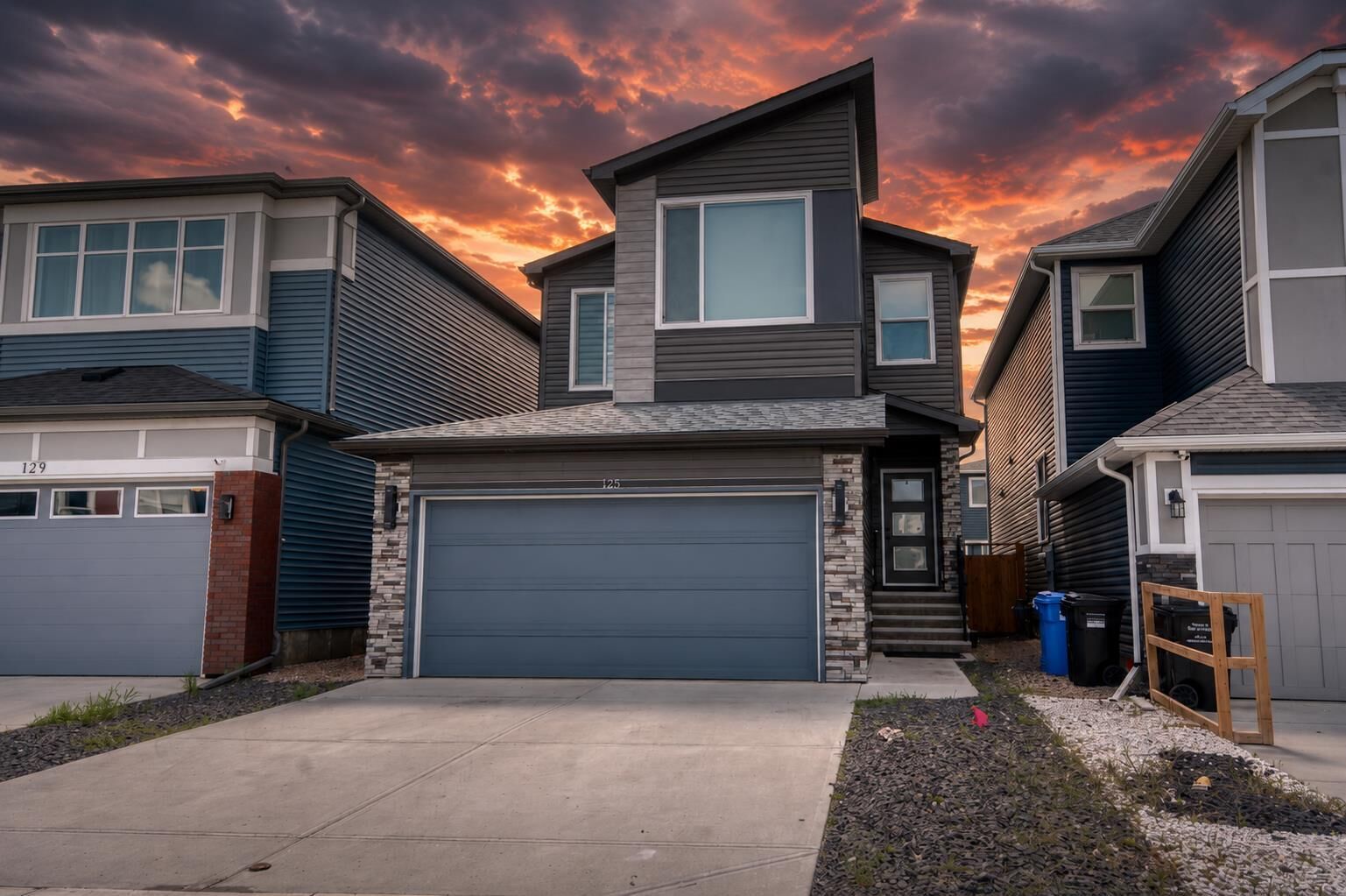 Property Photo:  125 Belmont Villas SW  AB T2X 4N5 