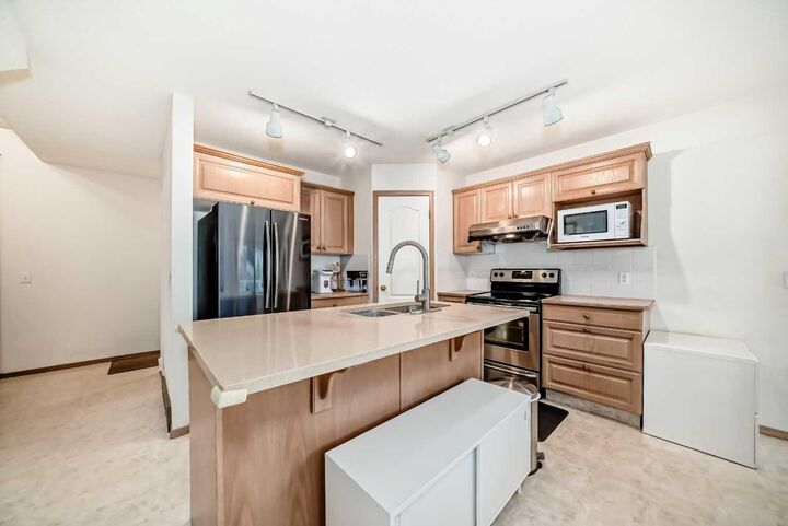 Photo de la propriété:  83 Hawkmount Green NW  AB T3G 3T9 