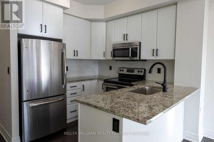 Property Photo:  111 Civic Square Gate West 216  ON L4G 0S6 