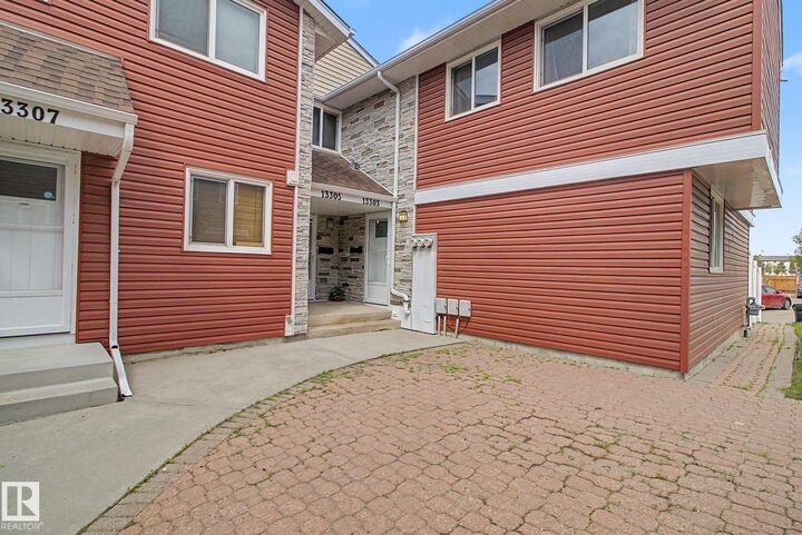 Property Photo:  13303 47 Street NW  AB T5A 3L5 