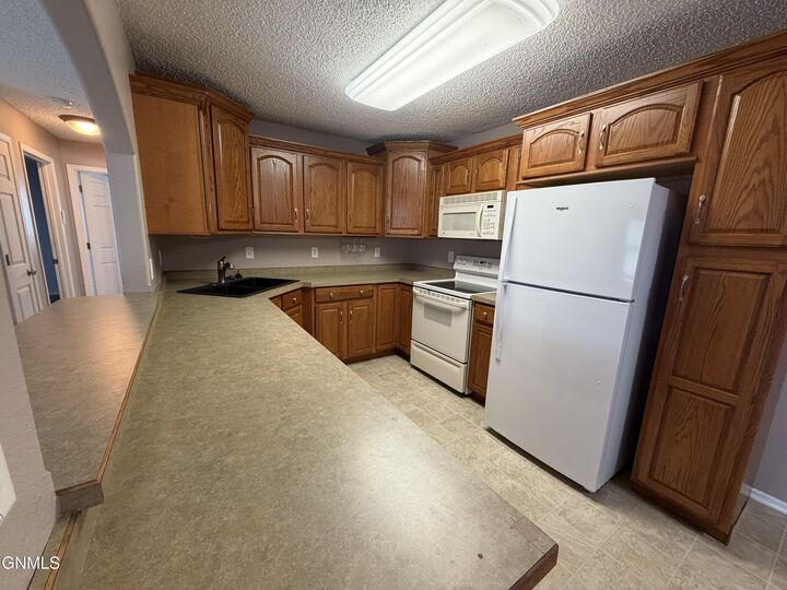 Property Photo: 120 Lake Avenue 4 ND 58504