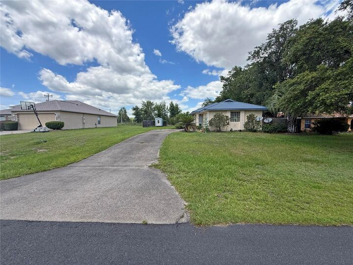 Property Photo:  5987 SW 129th Place Road  FL 34473 