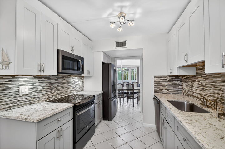 Property Photo: 3425 Via Poinciana 403 FL 33467