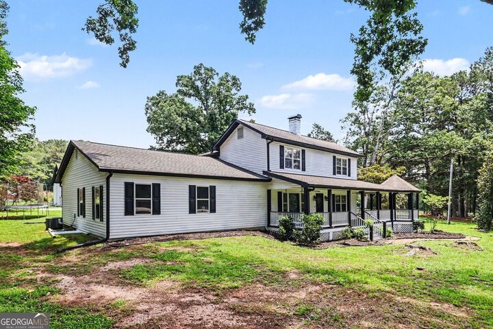 Property Photo:  813 Sandy Creek Road  GA 30214 