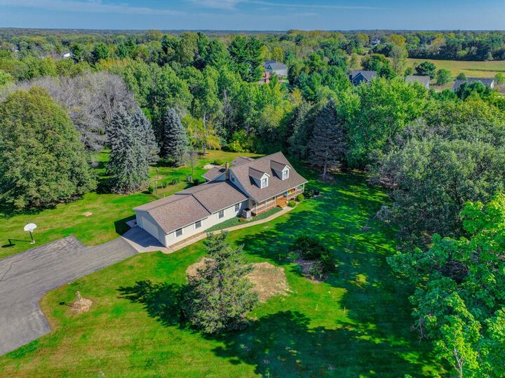 Property Photo:  7669 Minar Avenue N  MN 55082 