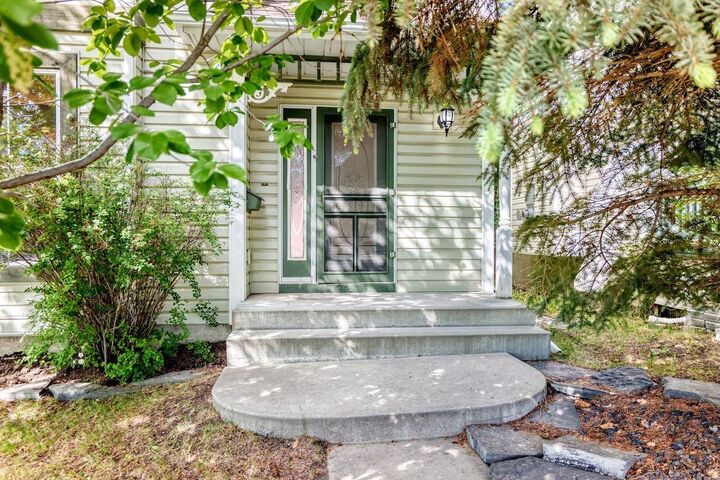 Property Photo:  105 Tuscany Way NW  AB T3L 2A4 