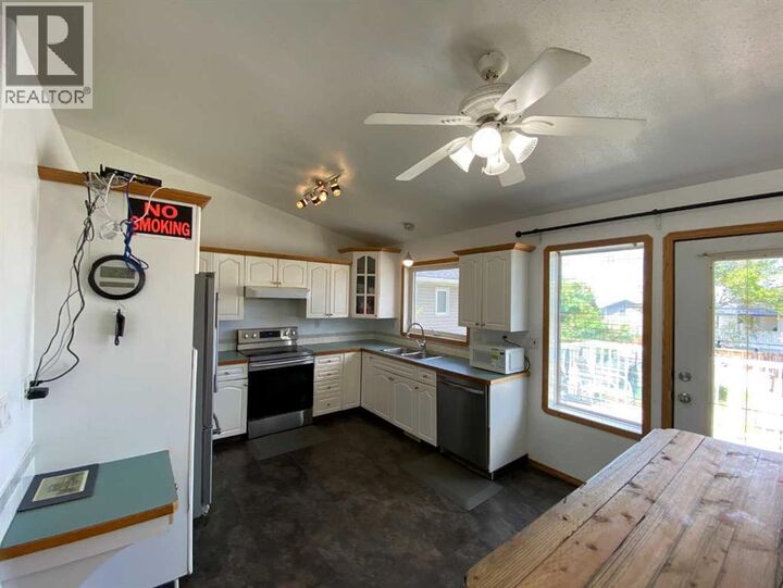 Property Photo: 52 Upland Drive West AB T1R 0P5