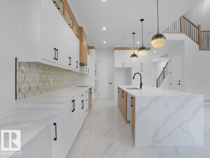 Property Photo: 6730 Crawford Way SW AB T6W 4L8