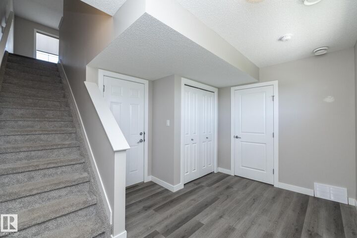 Property Photo: 2610 Maple Way NW AB T6T 2K1