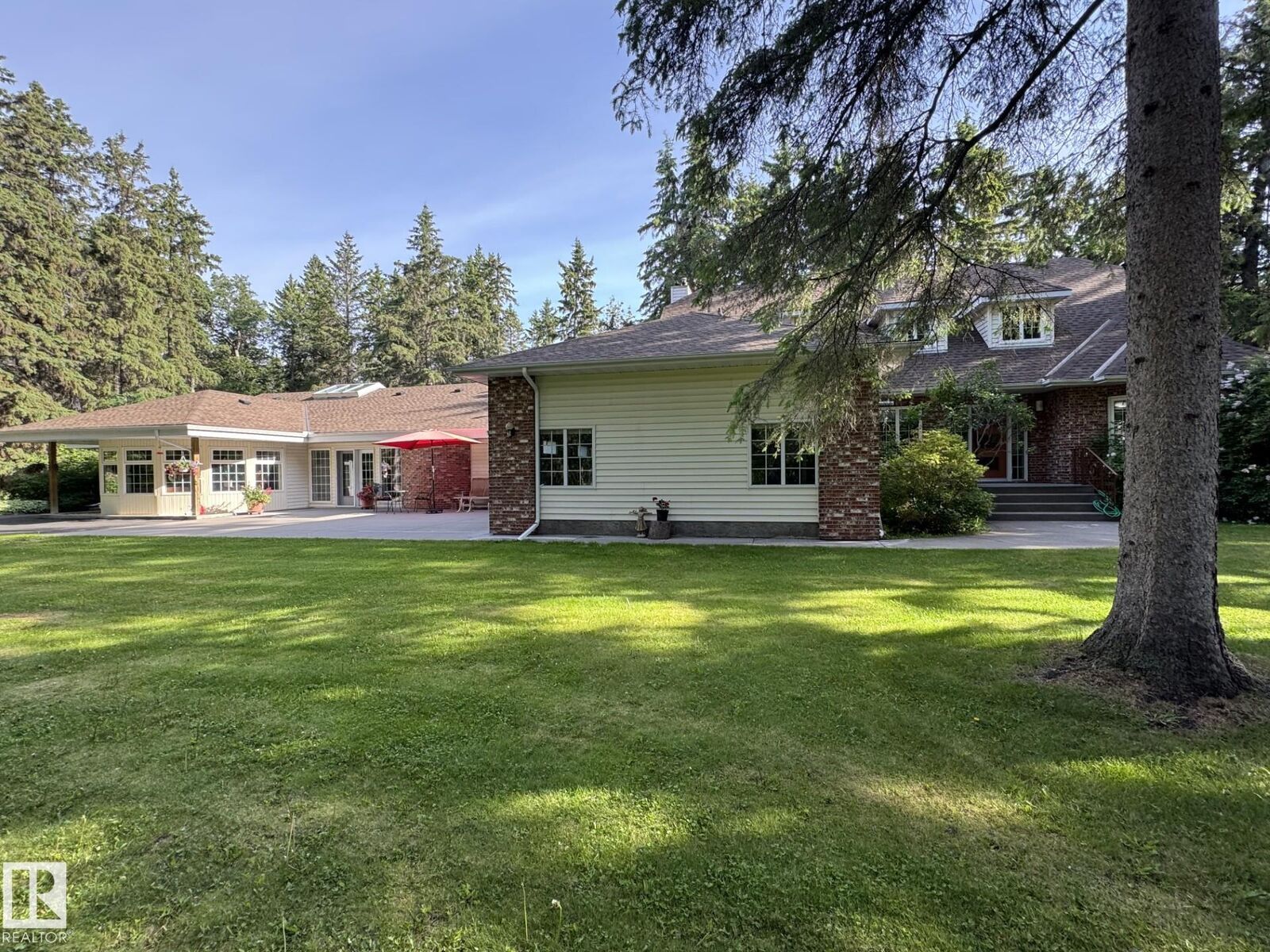 Property Photo: 244013 Twp Road 470 104 AB T9A 1W8