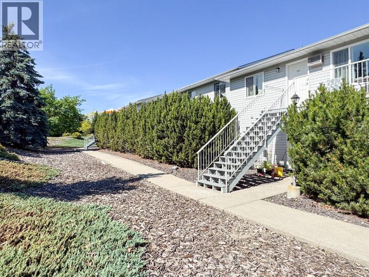 Property Photo: 1047 Middleton Way 213 BC V1B 2N3