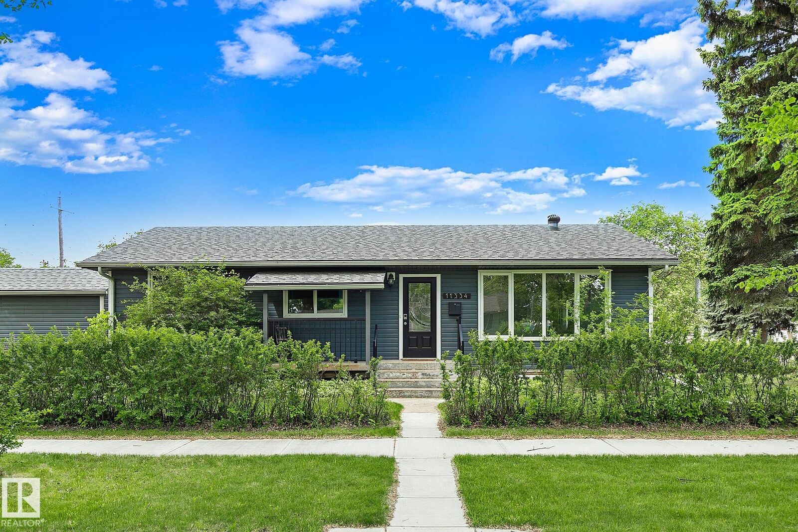 Property Photo:  11334 52 Street NW  AB T5W 3J1 