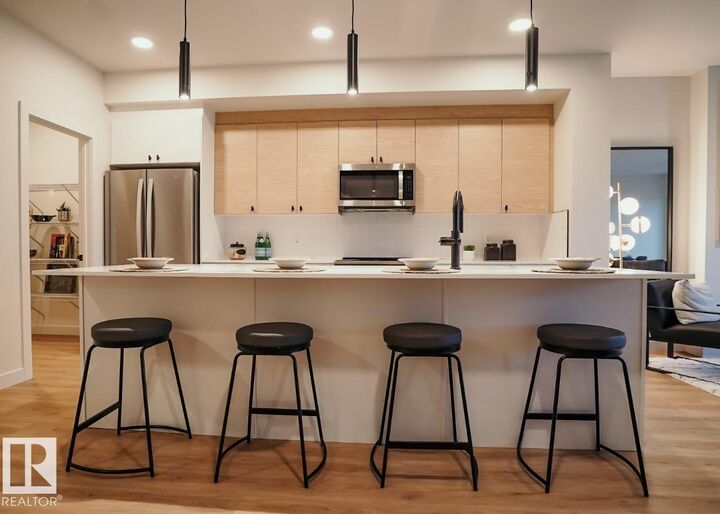 Property Photo: 304 33 Street SW AB T6X 1A7