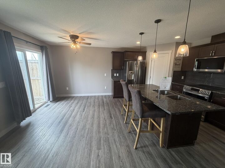 Property Photo: 6821 Evans Wynd NW AB T6M 0T3