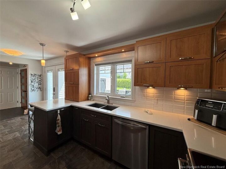 Property Photo: 59 42E Avenue NB E3V 2Z4