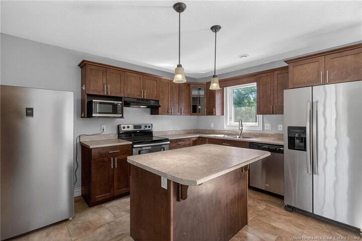 Property Photo: 57 Whisperwood Drive NB E1G 0P7