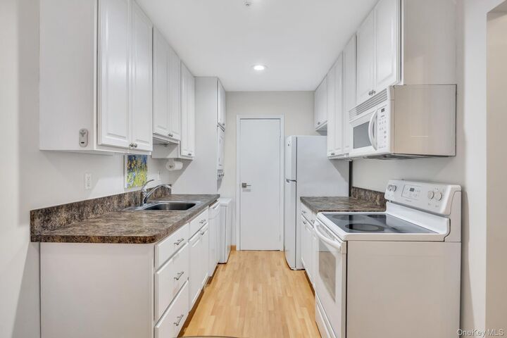 Property Photo:  703 Drew Drive D7  NY 11780 