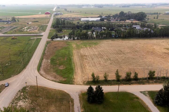 Property Photo: 56-210044 Highway 512 AB T1J 5N9