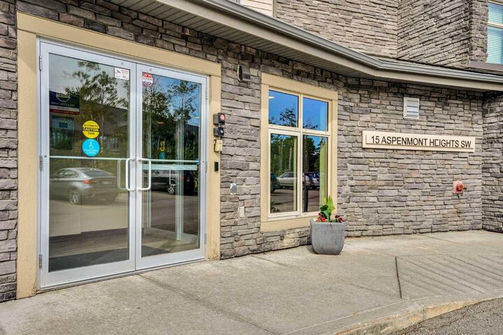 Property Photo: 15 Aspenmont Heights SW 214 AB T3H 0E3