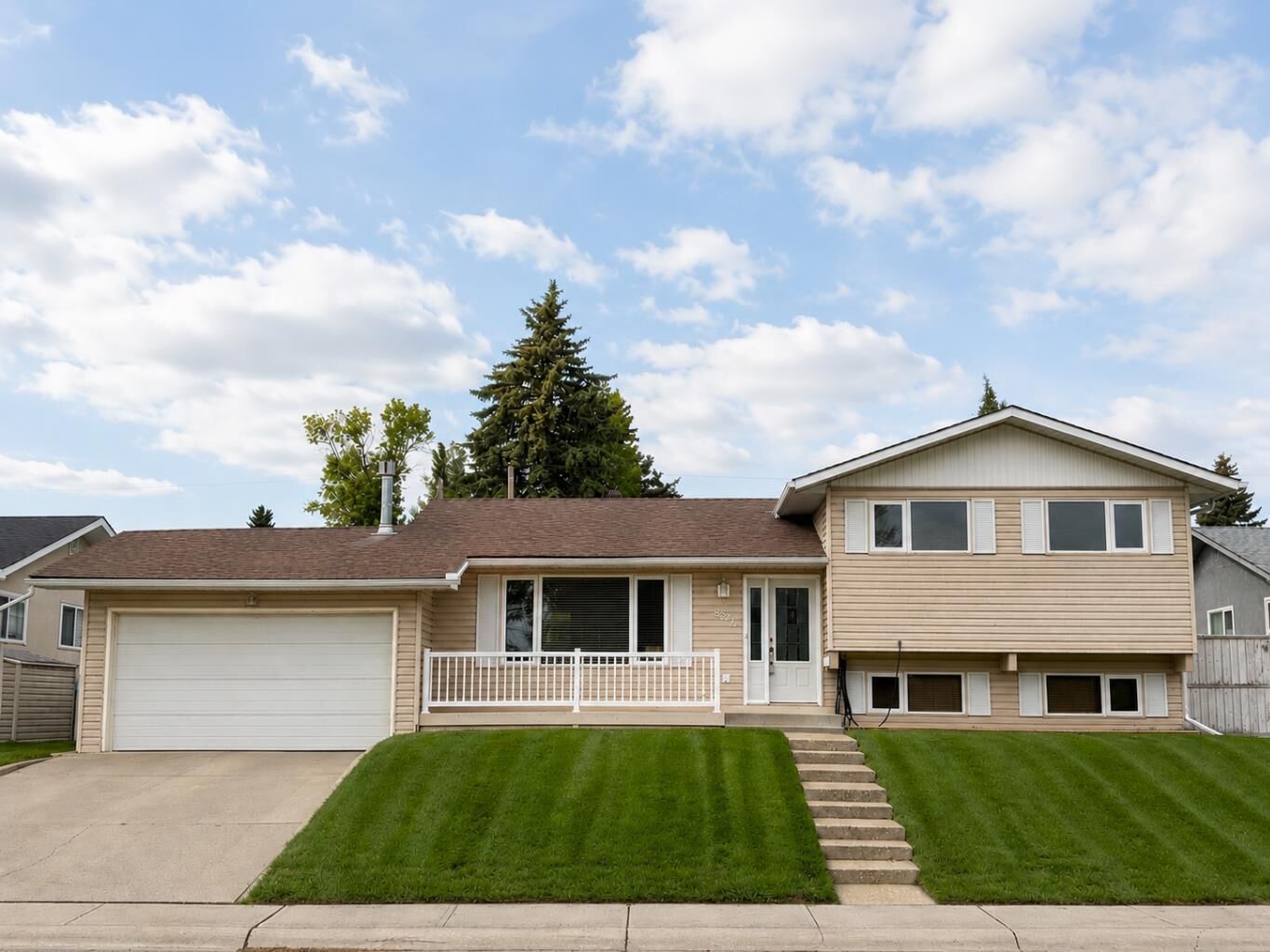 Property Photo:  8523 Addison Place SE  AB T2H 1R6 