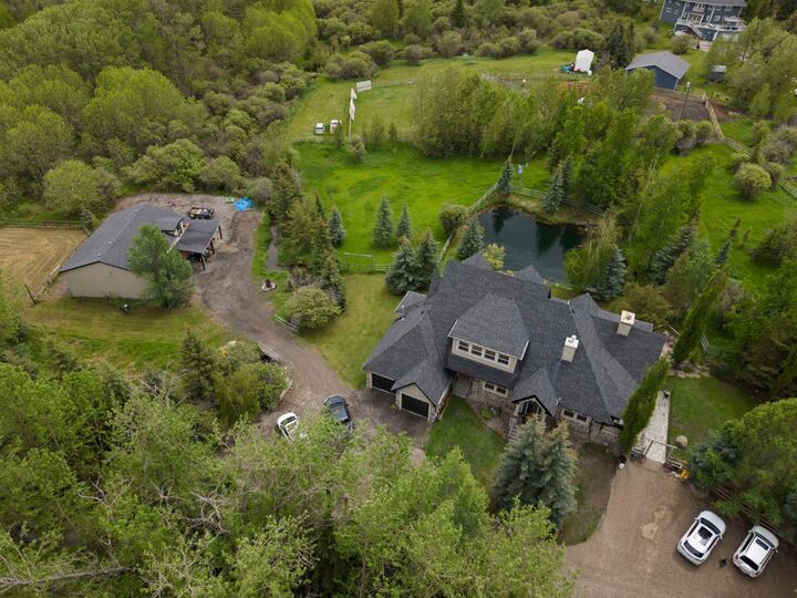 Property Photo: 162052 Priddis Valley Road W AB T0L 1W2
